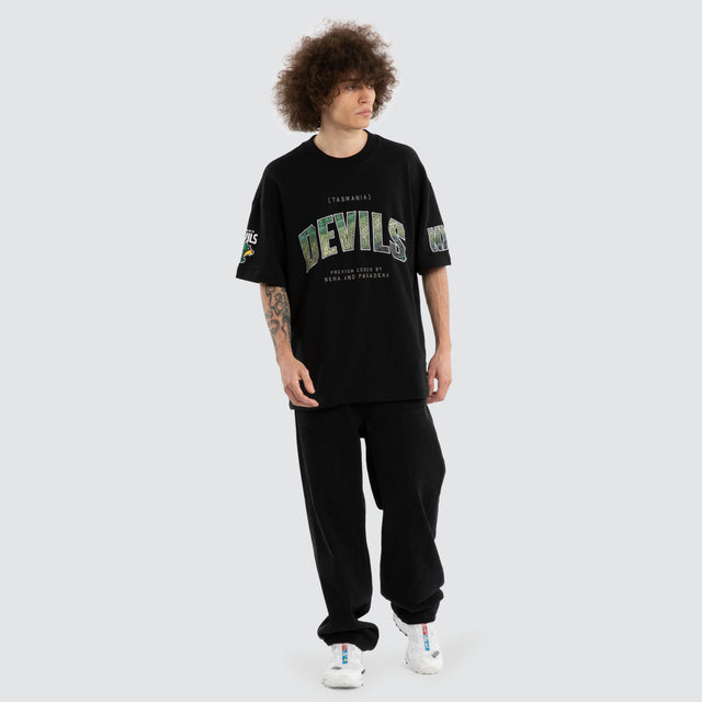 Model wears Ben Davis Tasmania Devils AFL Loopback Raptor Jet Black T-Shirts in Black - Image 6