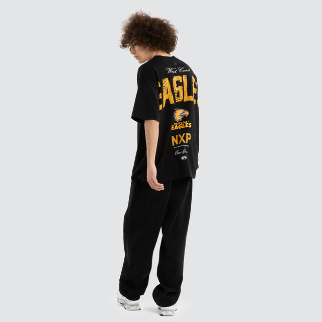 Model wears Ben Davis West Coast Eagles AFL Raptor Tee Jet Black T-Shirts in Black - Image 6