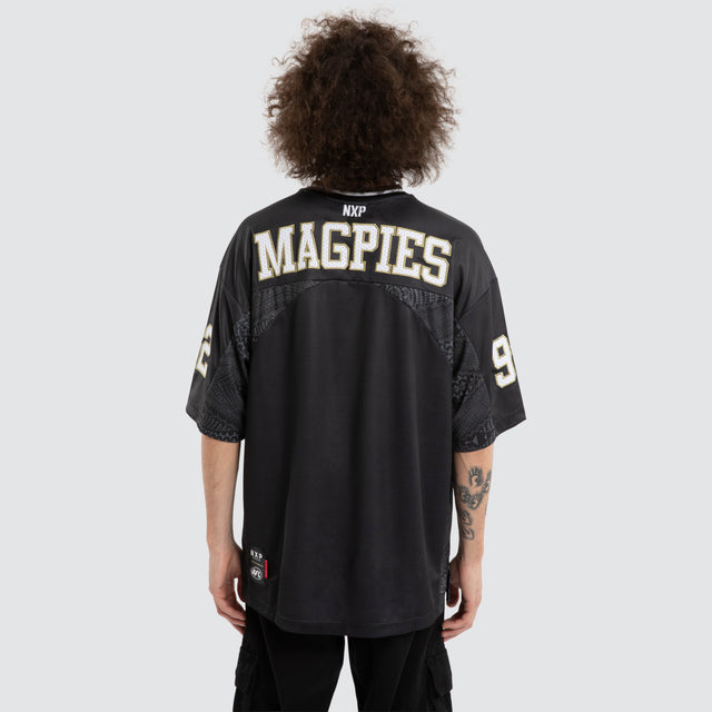 Model wears Ben Davis Collingwood Magpies AFL Mesh Jersey Magpies Black Jerseys in Black - Image 5