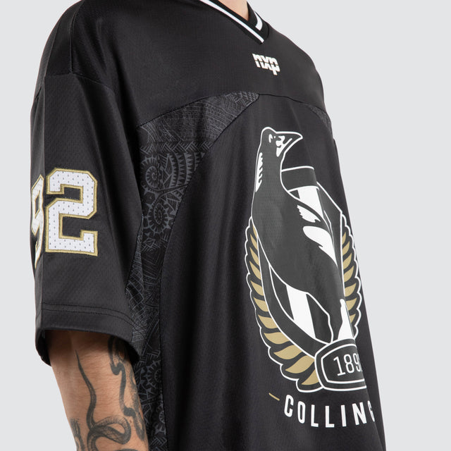 Model wears Ben Davis Collingwood Magpies AFL Mesh Jersey Magpies Black Jerseys in Black - Image 3