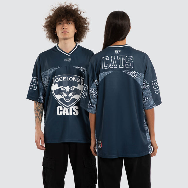 Model wears Ben Davis Geelong Cats AFL Mesh Jersey Blue Jerseys in Blue - Image 1