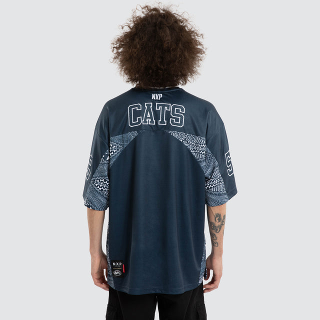 Model wears Ben Davis Geelong Cats AFL Mesh Jersey Blue Jerseys in Blue - Image 5