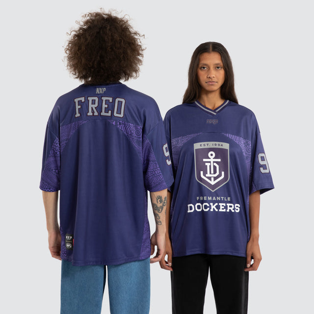 Model wears Ben Davis Fremantle Dockers AFL Mesh Jersey Dockers Purple Jerseys in Purple - Image 1