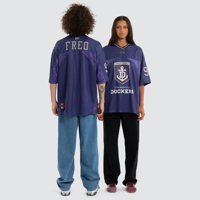 Model wears Ben Davis Fremantle Dockers AFL Mesh Jersey Dockers Purple Jerseys in Purple - Image 5