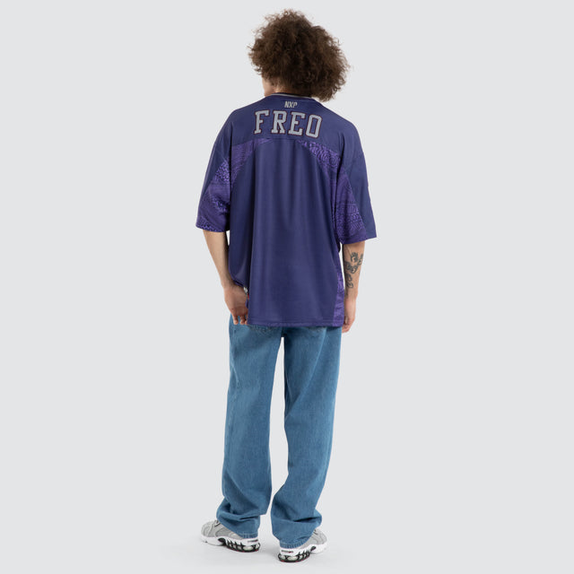 Model wears Ben Davis Fremantle Dockers AFL Mesh Jersey Dockers Purple Jerseys in Purple - Image 7