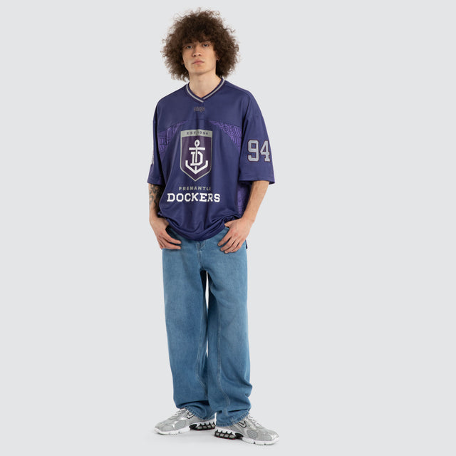 Model wears Ben Davis Fremantle Dockers AFL Mesh Jersey Dockers Purple Jerseys in Purple - Image 6