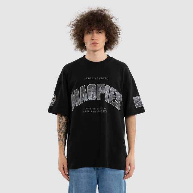 Model wears Ben Davis Collingwood Magpies AFL Loopback Raptor Jet Black T-Shirts in Black - Image 2
