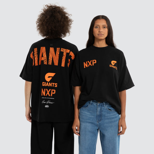 Model wears Ben Davis GWS Giants AFL Raptor Tee Jet Black T-Shirts in Black - Image 1