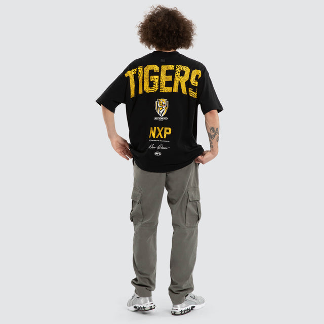 Model wears Ben Davis Richmond Tigers AFL Raptor Tee Jet Black T-Shirts in Black - Image 6