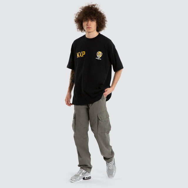 Model wears Ben Davis Richmond Tigers AFL Raptor Tee Jet Black T-Shirts in Black - Image 7