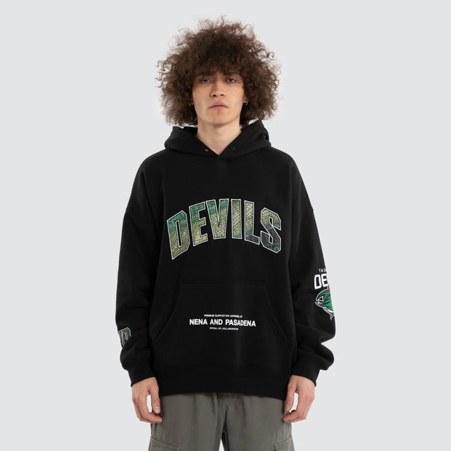 Model wears Ben Davis Tasmania Devils AFL Box Fit Hoodie Jet Black Hoodies in Black - Image 2