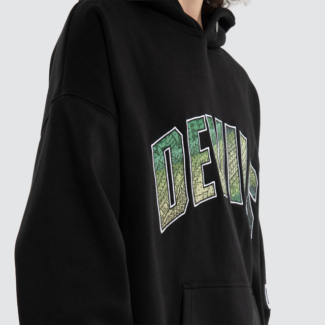 Model wears Ben Davis Tasmania Devils AFL Box Fit Hoodie Jet Black Hoodies in Black - Image 3