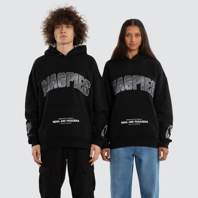 Model wears Ben Davis Collingwood Magpies AFL Box Fit Hoodie Jet Black Hoodies in Black - Image 1