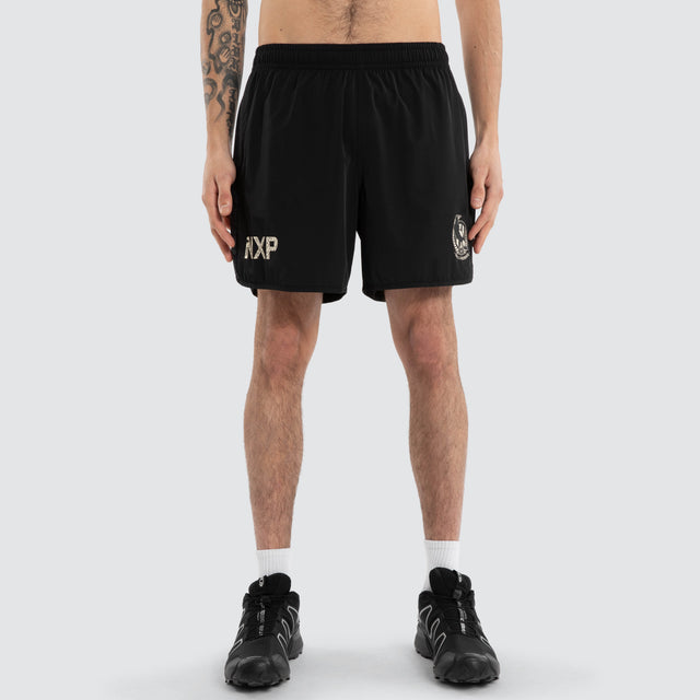 Model wears Ben Davis Collingwood Magpies AFL Sport Short Jet Black Shorts in Black - Image 5