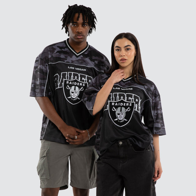 Model wears Las Vegas Raiders Field Tee Black Camo T-Shirts in Camo - Image 1