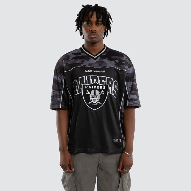 Model wears Las Vegas Raiders Field Tee Black Camo T-Shirts in Camo - Image 3