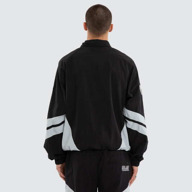 Model wears Las Vegas Raiders Racing Jacket Jet Black/Silver Jackets Black – image 3