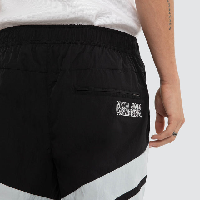 Model wears Las Vegas Raiders Racing Pant Jet Black/Silver Pants Black – image 5