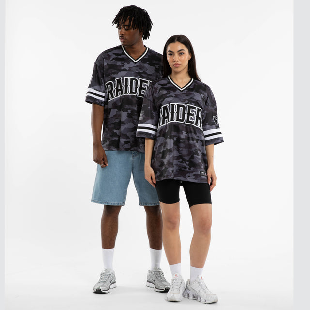 Model wears Las Vegas Raiders Brady Jersey Black Camo Jerseys in Camo - Image 4