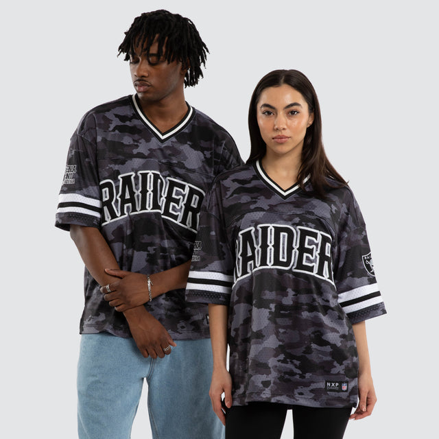 Model wears Las Vegas Raiders Brady Jersey Black Camo Jerseys in Camo - Image 1