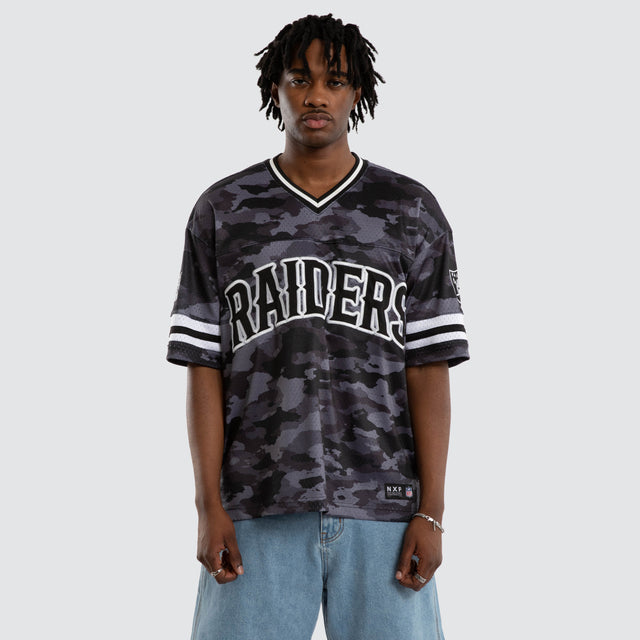 Model wears Las Vegas Raiders Brady Jersey Black Camo Jerseys in Camo - Image 5