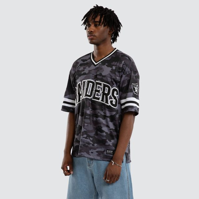 Model wears Las Vegas Raiders Brady Jersey Black Camo Jerseys in Camo - Image 6