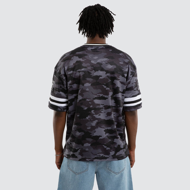 Model wears Las Vegas Raiders Brady Jersey Black Camo Jerseys in Camo - Image 7