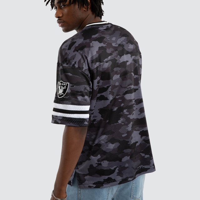 Model wears Las Vegas Raiders Brady Jersey Black Camo Jerseys in Camo - Image 3