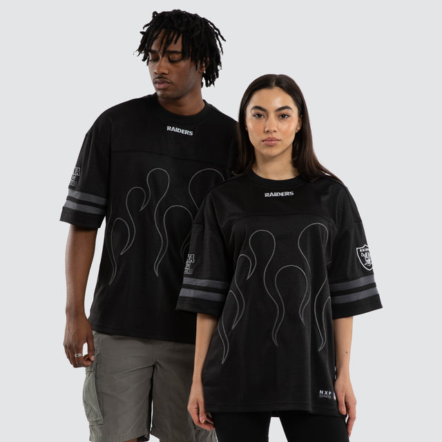 Model wears Las Vegas Raiders Dark Flame Tee Black T-Shirts in Black - Image 1