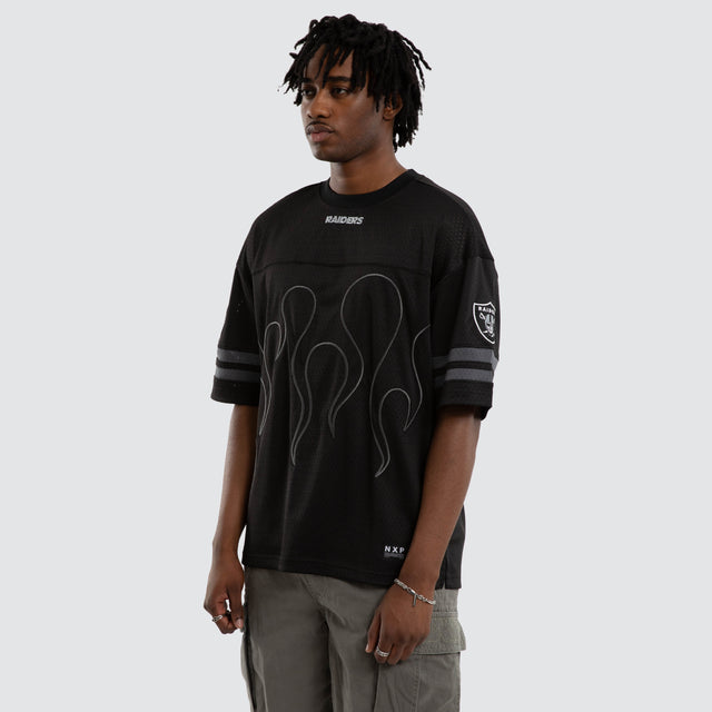 Model wears Las Vegas Raiders Dark Flame Tee Black T-Shirts in Black - Image 6