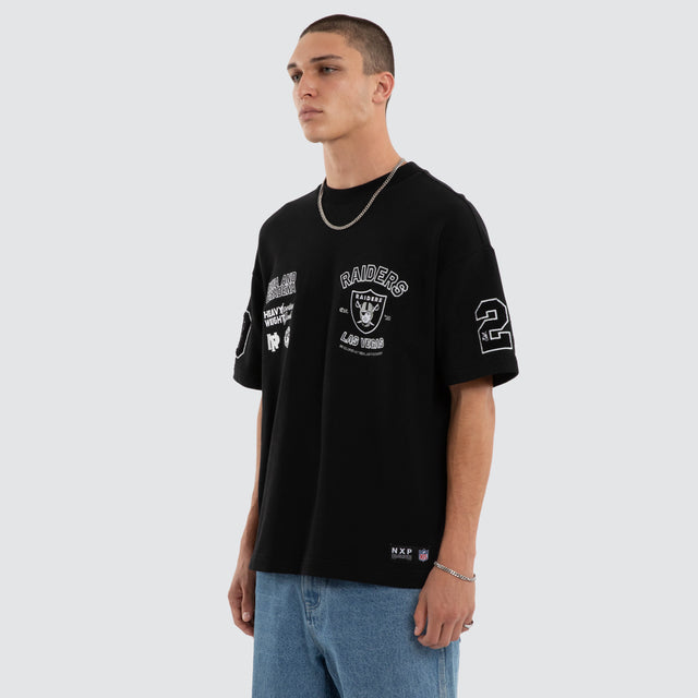 Model wears Las Vegas Raiders Founded Loopback Tee Jet Black T-Shirts Black – image 3