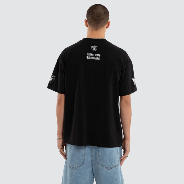 Model wears Las Vegas Raiders Shield Tee Jet Black T-Shirts Black – image 3