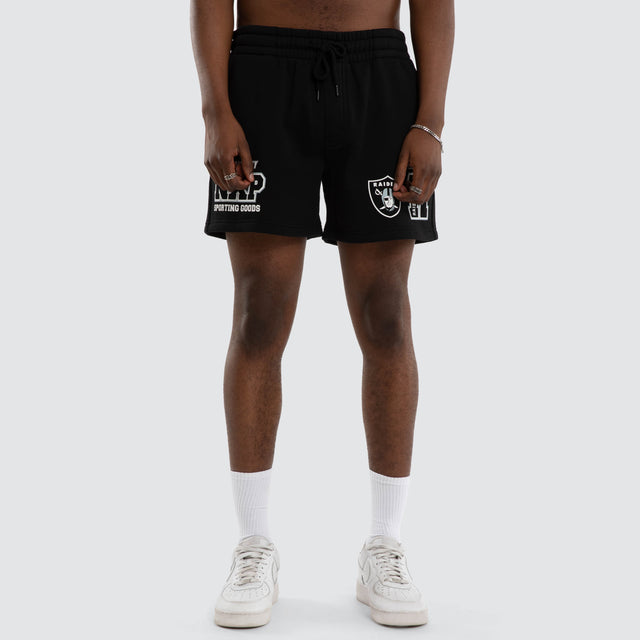 Model wears Las Vegas Raiders Sprinter Short Jet Black Shorts in Black - Image 4
