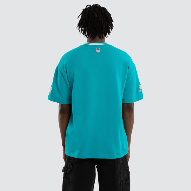 Model wears Miami Dolphins Game Tee Aqua T-Shirts in Green - Image 5
