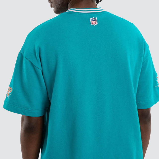 Model wears Miami Dolphins Game Tee Aqua T-Shirts in Green - Image 3