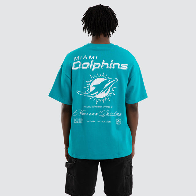 Model wears Miami Dolphins Positions Tee Aqua T-Shirts in Green - Image 6