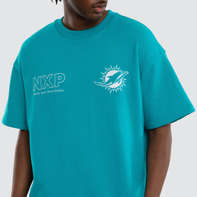 Model wears Miami Dolphins Positions Tee Aqua T-Shirts in Green - Image 7
