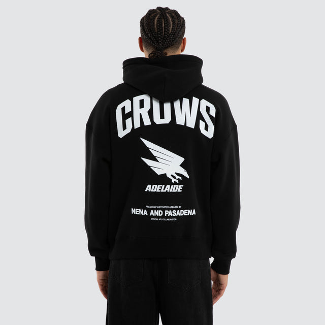 Model wears Adelaide Crows Champions Box Fit Hoodie Jet Black Hoodies in Black - Image 1