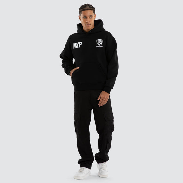 Model wears Richmond Tigers AFL Champions Box Hoodie Jet Black Hoodies in Black - Image 5