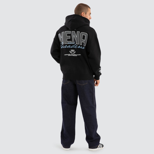 Model Wears Contained Relaxed Hoodie Anthracite Black Hoodies in Black - Image 5