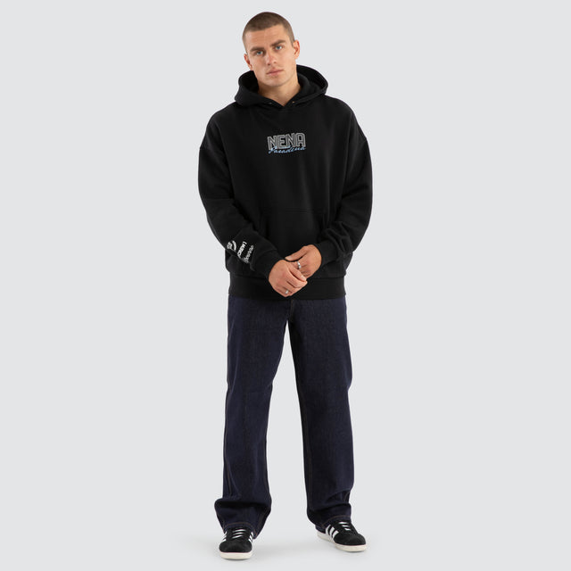 Model Wears Contained Relaxed Hoodie Anthracite Black Hoodies in Black - Image 4