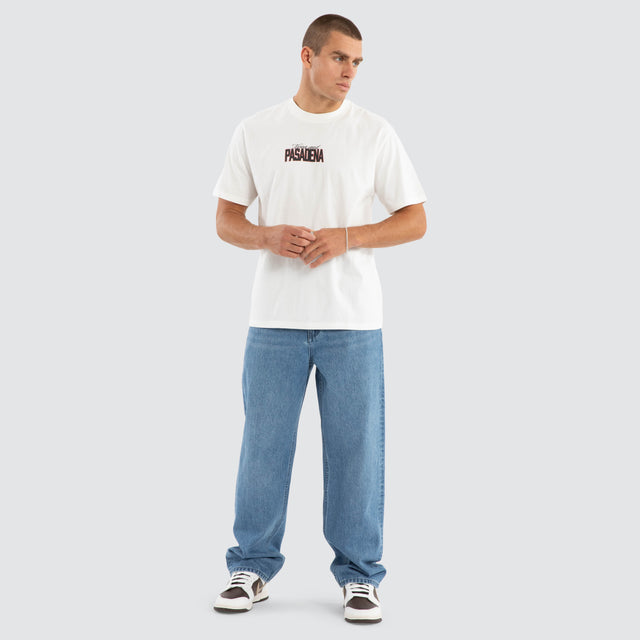 Model wears Distance Classic Fit Tee Natural White T-Shirts in White - Image 5
