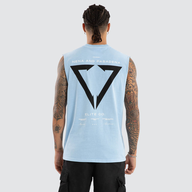 Model wears Warping Relaxed Muscle Pigment Blue Bell Muscle Tees in Blue - Image 1