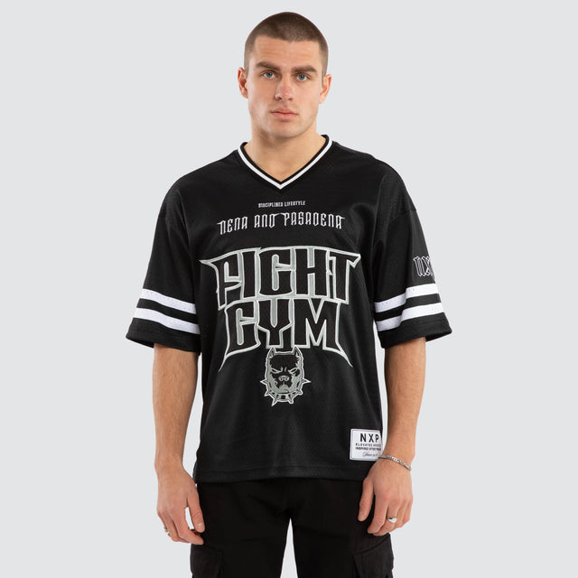 Model wears Brute Gridiron Jersey Jet Black Jerseys in Black - Image 1