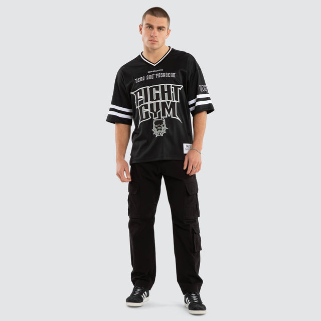 Model wears Brute Gridiron Jersey Jet Black Jerseys in Black - Image 7