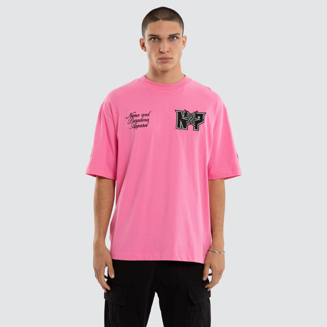 Model wears Figures Oversized Tee Pink T-Shirts in Pink - Image 1