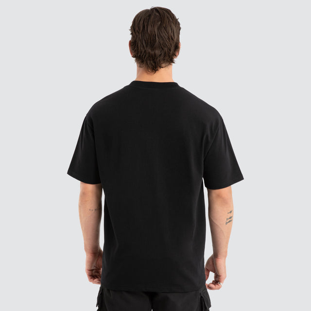 Model wears Vesture Box Fit Tee Jet Black T-Shirts Black – image 3