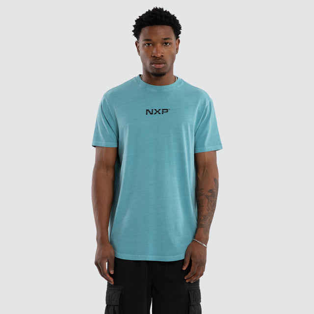 Model wears Vacant Dual Curved Tee Pigment Cameo T-Shirts Blue – image 1
