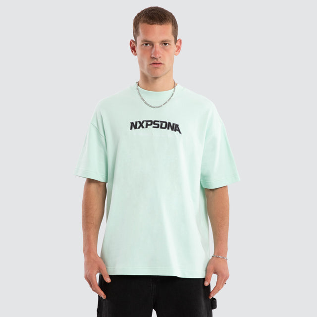Model wears Airflow Loopback Raptor Tee Brook Green T-Shirts Green – image 3