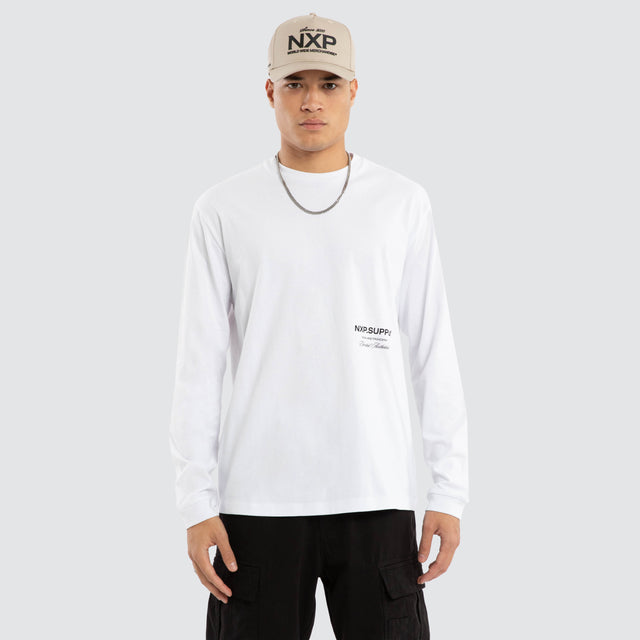 Model wears Threads Relaxed LS Tee Optical White T-Shirts in White - Image 1